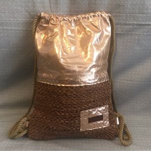 Kostis Woven Leather Drawstring Pack Bag in Rose Gold Metallic